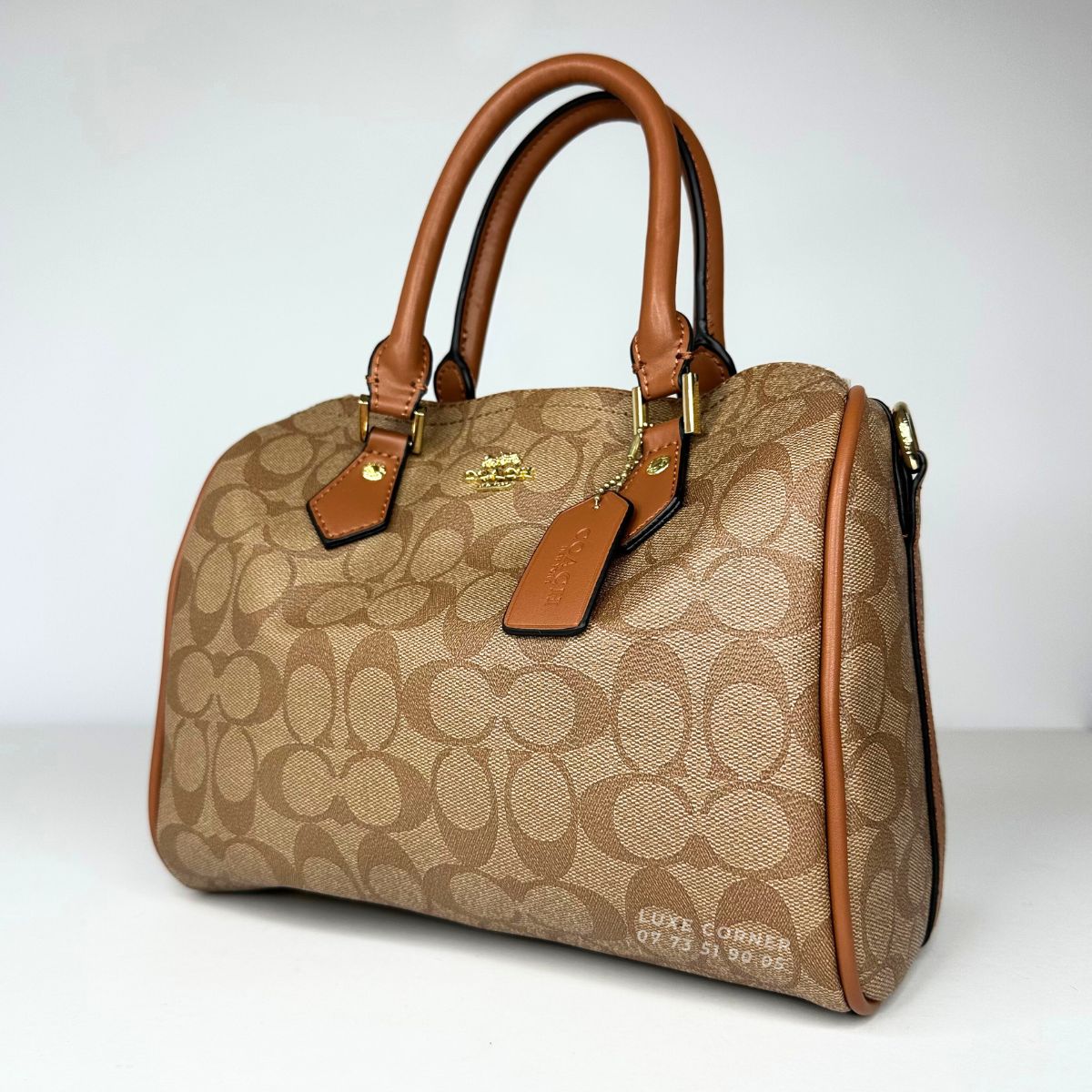 Sac Coach Rowan en toile signature