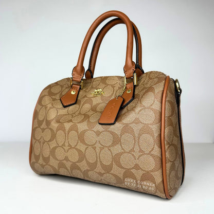 Sac Coach Rowan en toile signature